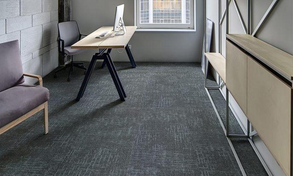 Why are office carpets crucial for a productive workspace